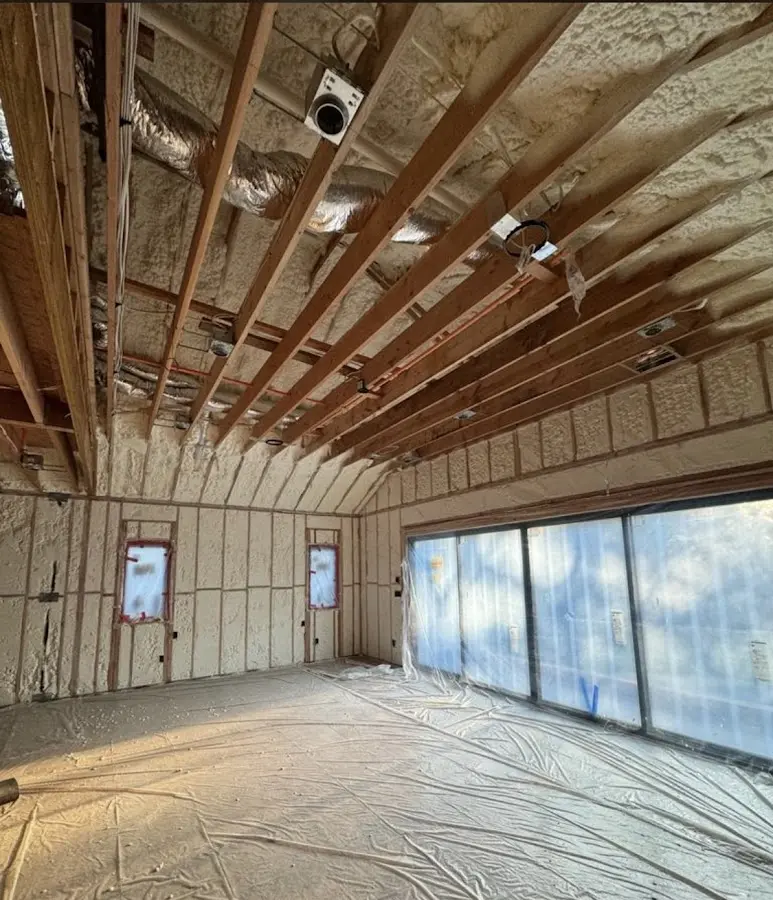 Interior walls and ceiling insulated with spray foam during new construction in West Vero Corridor